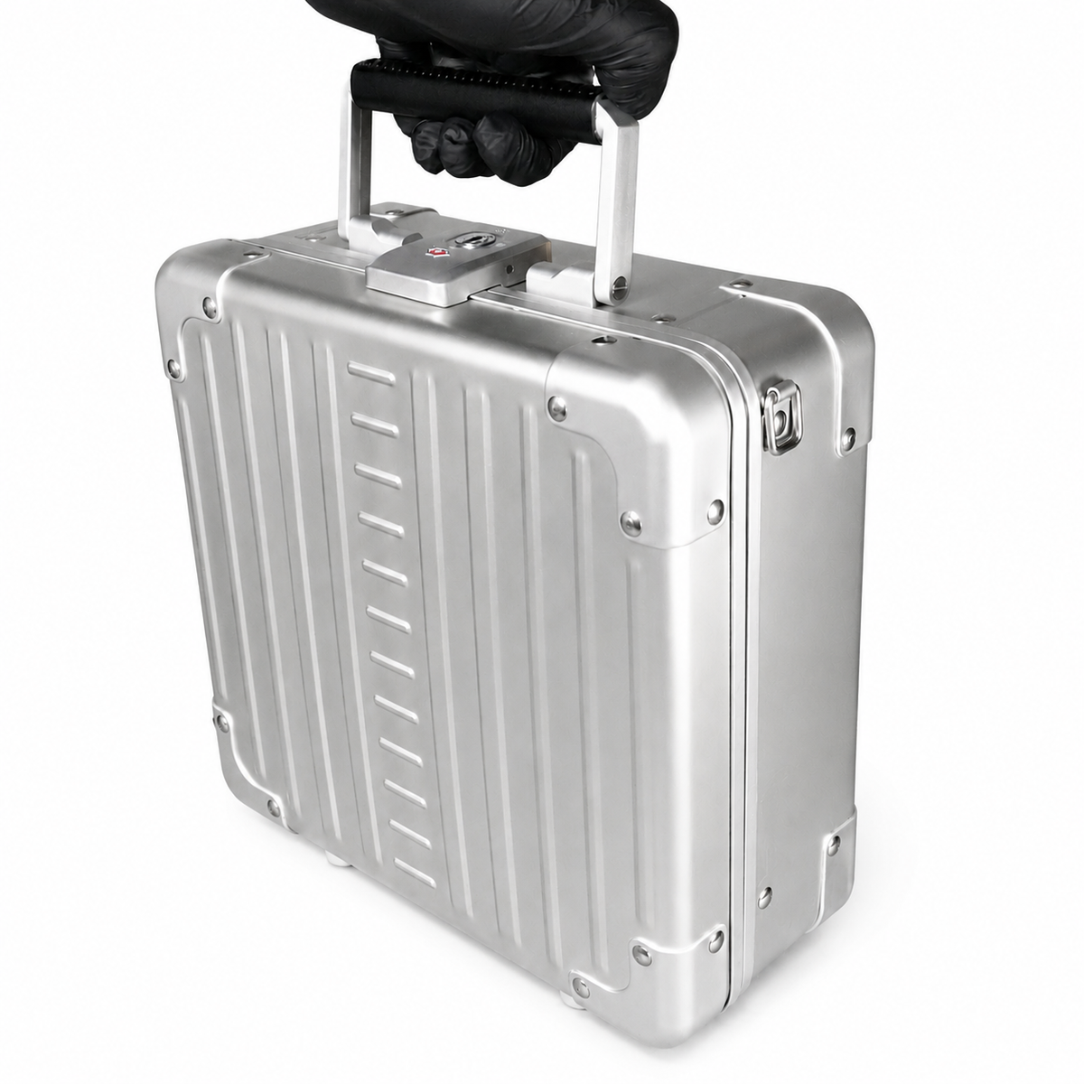 Aluminium personal item flight case being carried by hand to demonstrate its size and portability.