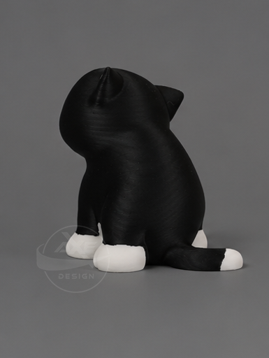Rear view of the black and white cat bread collectible.