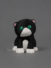 Black and white cat bread collectible with interchangeable bread accessory.