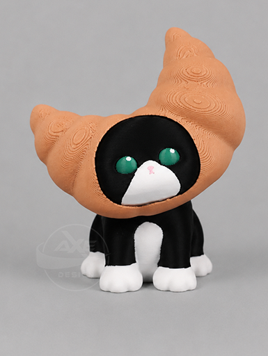 Black and white cat bread collectible displayed with the croissant accessory.