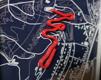 Close-up of a bobsleigh track display showing the detailed track outline and finish.