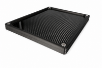 Angled view highlighting the real carbon fibre finish and spacious compartments of the organiser tray.