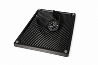 Large carbon fibre organiser tray storing everyday carry essentials on a desk.