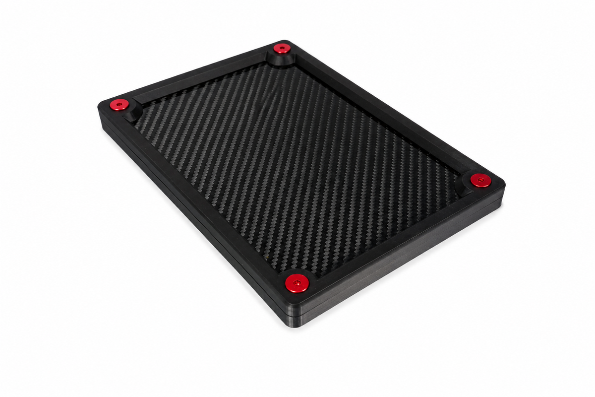 Small carbon fibre organiser tray for keeping everyday essentials neatly organised.