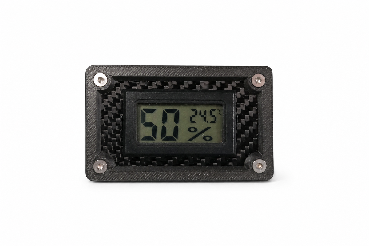 Front view of the carbon fibre thermometer and hygrometer mount showing the real carbon fibre face plate.
