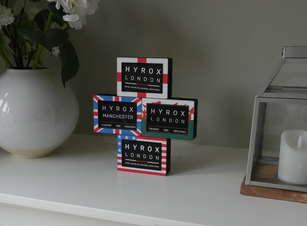 Four modular HYROX patch displays arranged as a custom collection.