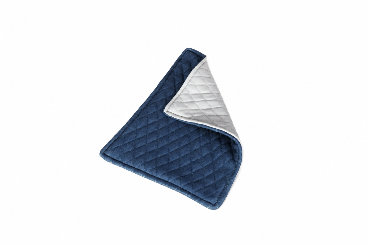 Folded navy quilted valuables cloth with a premium quilted finish.
